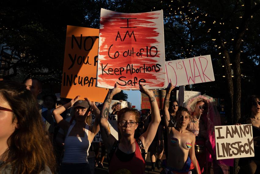 Demonstrators march against the overturning of Roe v. Wade, which virtually bans abortion in the state of Texas, on June 24, 2022.